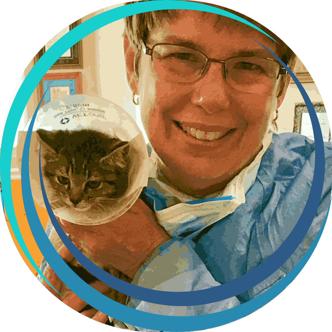 Smiling vet with kitten e-collar.